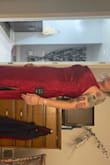 This fits snugly enough to be flattering but I still feel like I can eat dinner with it on. LOL The fabric has a faint pattern to it that makes it more fun than just a red slip dress. I can't wait to wear it to a holiday dinner party! - Emily D.