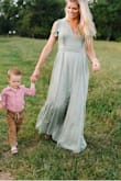 The detail on this dress is so pretty, very feminine little touches that make it very pretty. Color is a pale green but worked great for my family photos. The sleeves are open on the sides which I didn't realize at first but just adds to the details. - Jessica R.