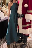 I wore this to a festival of trees gala and got so many compliments. I definitely had to iron it after the shipping packaging, but I figured that would be the case. I am small chested, so it fits me well, but I could see it being tight on the top for those that have larger chests. - Julie R.