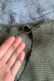 I loved this sweater but unfortunately Lulus placed the tag in a bad area. The fabric got snagged and started unraveling right away. The sweater is ruined and I cannot wear it now. - Ashley J.