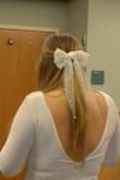 My husband and I wanted a very simple, short ceremony. Since that was the case, I was not really wanting a veil, but I did want something to add to my hair. This bow completed the look I was imagining! It was perfect! Would highly recommend! - Lindsey C.