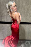 This dress was stunning!! The red silk fabric looked incredible in person. I got so many compliments. Only thing I have to mention is a strap did break on the first night of wearing it. - Melissa M.