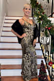 This dress was absolutely stunning and very easy to have altered. The straps are adjustable which I liked a lot, but I didn't love the look of the straps so I bought a "black faux fur stole" to wear with it, and felt amazing! I was complimented so many times and the dress was a very reasonable price. - Andrea J.