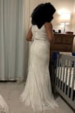 I really liked this dress! Originally ordered an XL (what I'm wearing in the photos) but went with a large. It's so elegant and flattering on. I am large-busted so a nice push-up bra will be needed to take it to the next level. Sequins were lovely throughout and the tulle made for whimsical feel. Possible wedding dress! - Elizabeth C.
