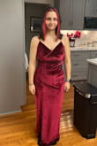 I purchased this dress for a wedding in February, and I've been dreading even having to find a dress. I really thought this was going to be the dress I returned for being too "revealing", but people, it truly is very flattering. I also originally thought the leg slit was going to be "too sexy", but it's the PERFECT amount of sexy and still somewhat modest. If you're having doubts about this dress, don't!!! Buy it!! The material is a little stretchy, which is good because I DO plan on eating at the wedding. For me personally, I plan on wearing Spanx but could work without. I'm wearing the top part a little too high up in the picture. If you have a smaller chest and are comfortable not wearing bras, it's possible to get away without one or padding. I can't stress enough how much I love this dress. I've never been more confident in a dress before. - Cait C.