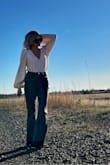 I love love this bodysuit its almost a little pink which made it even prettier! Fits very true to size. I almost want to buy another just because I love it so much - Julie H.