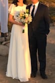 I loved this dress!! I used it in a small ceremony outdoor wedding and it was perfect. It arrived quickly and fit great (a little long, I could have used higher heels). The fabric is really white and had no defects. - Patrycia N.