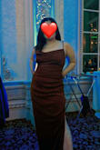 I bought this dress to attend my friend's wedding, and I love the way it fits on me! Full disclosure: I did wear it with light shapewear underneath to give the dress a smoother look. I was impressed with how the dress hugs all the right curves, and bonus points that the length is perfect for someone who is 5'2" with no alterations needed! Being a shorter gal, I'm used to getting my maxi dresses altered to take out the length, but this fits right of the packaging! The "gold shimmer" gives an extra illusion of smoothness and glam. The slit was not too high and the material was sooo comfortable. So glad I got this dress! - Cindy A.