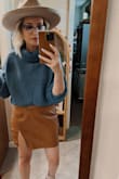 Loose in the waist but it stays up fine since I have hips and a butt. Definitely could go down a size. I have it in black and the brown Color. - Jennifer K.