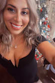 I loved this dress. I had to get it hemmed as it was definitely way too long for me. Great quality. Has a nice stretch to it. No need to wear a bra with it. Very flattering. - Dominique D.