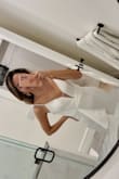 I was amazed by the quality of the dress, Fitted perfectly, and the detail in the front was just beautiful, I swear I cried when I tried it on, beautiful dress, couldn't imagine it better! I'm in love = - Lorena H.