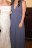 Wore this as a bridesmaid. I had to have some alterations done to the sleeves/chest/bust area but otherwise it was great! - Megan C.