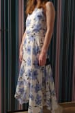 The Beautiful cut is elegant but girlish as well. The fabric is soft and light. I wear size M but size S is better this time. - Anna W.
