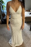 The XS fit was perfect for me. I loved the shape. Unfortunately, I returned it because I felt the sequins looked too cheap for my wedding day. - Melissa Z.