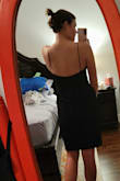 This is the perfect little black dress. Material is thick enough to smooth out any imperfections. The length of the dress hits at my knees, but there is a substantial slit. Really love the neckline and back. Have not worn out yet, but looking forward to doing so. - Kelsey L.