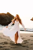 Tall girls rejoice! This is the perfect dress for tall girls. Order a size down, I'm always a Medium, and a Small fit perfectly. Used for engagement photos, and it is just perfection. - Allison J.