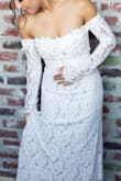 I got sooo many compliments on my dress. I would choose this dress over others that cost $500+. All I had to do was hem the bottom since I'm 4'11"/petite. I also added a simple crystal belt from David's bridal & it was perfect. I will say that it's a bit difficult to raise your arms due to the sleeve design/neckline, so I couldn't do all the poses that my photographer was asking me to do lol but it wasn't a big deal. The zipper is a bit difficult to zip up & it gets caught at times but you really just have to find the right method (my sister had no issues once she figured out how to finesse it). I felt so sexy and elegant the whole night. - Zef B.