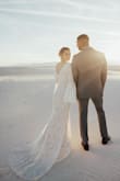 I purchased this dress for my elopement photos and I could not be happier with how it looked on me and in the pictures as well! Not only is it gorgeous, it's comfortable and has room to move and dance. I've gotten so many compliments about my dress. - Paige V.