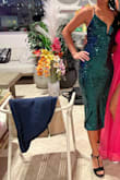 I LOVE this dress. Fit well, comfortable, great color, fabulous! Lightly padded so I didn't need a bra. I didn't dance in it so I have no review on that specifically. With the high slit and open back it's a great option for a sexy dress if you don't necessarily want a super short skirt. - Alexis L.