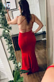 LOVE this dress! Based on the other reviews I ordered a large but the straps in the back were a little loose so I could've worn a medium. I suggest ordering true to size. Despite it being a little big, this dress was a stunner! - Carrie T.