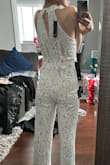 I was fixed on finding a cute bridal outfit (rehearsal or bridal party) and I really want to make sure it was a jumpsuit. I have been eyeing this one for the longest time and finally checked out. No regrets whatsoever. I love the silhouette, the fit, and the overall vibe of it. Looking forward to wearing this! - Florizza R.
