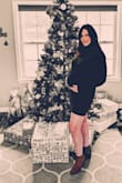 I am 28 weeks pregnant and was looking for a bump-friendly dress for a Christmas Eve party and this was the perfect dress! It's soft and so flattering! I am usually a small or medium pre-pregnancy so I opted for a medium. I received so many compliments and it also came out great in pictures! - Laura R.