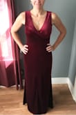 The dress was perfect except for the slit. The pictures online showed it on the left leg, but my dress had the slit directly in the middle. I was contemplating returning it, but decided to keep it since the fit was very comfortable and the color was pretty. - Twin A.