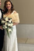 I bought this dress for my winter elopement with my fiancé and it was perfect! I initially ordered this dress in a size L but had to size up to an XL because it was tight in the chest (I just had a baby 3 weeks prior so I wasn't accounting for baby boobs). It made me feel elegant. I loved the mini train and the classic lace. It did get a little staticky between the lace material and the slip underneath but I did not manage that prior to wearing it. Customer service was excellent as well and expedited the L to XL exchange quickly when I mentioned that I was planning to wear it to my elopement right around the holidays. Lulus is the best! :) - Dana S.