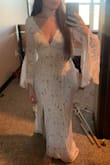 If you're looking for a classy, fitted, lacy wedding dress, this is it. Stunning dress and fit so nicely right out the box! Like other reviewers, I had to attach the lining to the dress. But, it was super easy, cheap, and fast with fashion tape. Dress was also long on me, but I bustled it for the rest of the day and didn't have any issues. Low cut, but I was still able to wear a plunge bra no issue. Loved the sleeves, made me feel like a magical spider queen. - Rachael F.