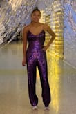 This jumpsuit was perfect for my daughter's winter formal. The straps don't offer much support, but that isn't really a factor because it fits true to size. - Amanda F.