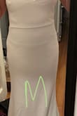 Fabric is of good quality. I originally ordered a small, but the fabric pulled unflatteringly across my stomach and butt. The medium is a better fit for my midsection. I will have to get the top altered, along with a hem, but that's okay. - Rachel T.