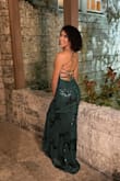 Loved this dress. Color was beautiful and the dress itself was fit to my body. Very flattering shape. Would say it's a little big around my bust but that's always the regular , was able to tighten with straps. Has a beautiful tail and matched with gold jewelry . Wore to evening NYE wedding as a guest. - Michelle A.