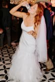 I ordered this dress for my 10-year vow renewal! It was so much fun and looked way more expensive than it was! I did remove the breast pads as they were too small but the dress was thick enough I didn't need any added padding. I have a bigger rib cage and had to have it let out a tiny bit on either side for breathing room but otherwise, it fit like a glove! I thought I may have trouble with dancing with the tight mermaid fit and big tail, but it hikes up comfortably without looking awkward!! I couldn't be happier with this purchase! - Chandler A.
