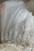 I was so impressed with the quality of this dress. The detail is so beautiful! I would recommend to anyone!! The skirt of the dress has a little sparkle, but I think it adds a nice touch. - Lianne M.
