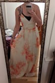 This dress is gorgeous and so majestic. The quality is top notch. I love it and can't wait to wear it out. - Brittany D.