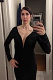 I wore this dress for a NYE Masquerade Party. I received tons of compliments!! The overall fit was great. I did have to wear pasties and boob tape for a little lift. The metal V kept the dress close to my chest. The hanger helpers did come out at times and just had to be re-tucked. Pictures from end of the evening. - Meghan S.