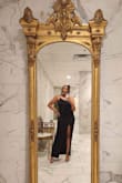 I purchased this dress after months of looking for the perfect LITERAL 'black tie' wedding guest dress. It was a knockout and with these long legs -- made me feel and look like a model. I didn't have to wear a bra or Spanx (which I normally do) and everything was very flattering. It was perfect for a winter wedding because it was flexible enough to dance but thick enough to provide support and warmth. I would say GET THIS DRESS!!! - Jocelyn D.