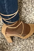 These heels are versatile and comfortable. Can be worn with jeans or dresses. Im not a fan of chunky high heels but these are slender enough to look like a petite high heel. Comfortable and straps stay up good around my leg. - Nene J.