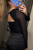 I originally got the small but decided to size it down so that it would be a little tighter up top. The only thing I don't like about it is that the girls aren't super secure. If I bent over I would be near the flashing. But a perk is that it is lined, so you don't have to wear a bra if you have fuller breasts than I do. Besides the top being a little loose from the wide neck, I love it! It's super cute and is a great addition to any wardrobe - Clarice A.