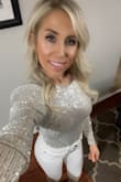 I wore this for New Year's Eve and absolutely love it! I got so many compliments. Comfortable fit and sexy back. I'm usually an extra small top, so it ft true to size. I did cut out the shoulder pads and liked it better without them. Highly recommend! - Krystle R.