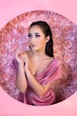 I purchased this mini dress for a photoshoot. The model was a size small and it fit her like a dream. The material is thick and beautiful. - Jamie R.
