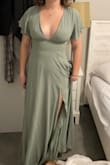 I got this dress for a wedding I'm in. It's so flattering for truly any body type. It's snug on my ribs cage area but not uncomfortable. I never felt like i was going to lose my boobs with the more revealing look. The color is exactly as described. I love the leg slit and more open chest for a sexier elegant look. The back is open too for us women who tend to need AIR when getting too hot. The material is good quality too. I would get this dress in every color. - Hanna J.