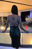 I wish I could wear this to every event. The fit was perfect. I don't have a large chest and deep Vs never really look good on me. This dress has a little metal piece for the V part that keeps it in place and keep the shape. I felt comfortable and beautiful in this dress all night. I read a comment before that said you should buy this even to wear around the house and I agree!! - Amanda D.