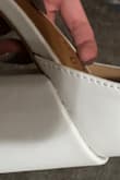 Beautiful shoe concept but I can't help but notice the poor quality. There is scratches and nicks on the fabric of the shoe. Wanted to wear to my wedding but will have to pass. Purchased final sale so can't return. - Damarys P.
