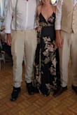 Dress is so comfortable! Fit true to size and made me feel chic. Material was thick and heavier than expected but made really well. Definitely not a complaint. There is a slit in the leg which made me feel sexy. Absolutely love! - Michelle T.