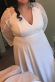 After reading some other reviews I sized up to an XL, I couldve done a L but for comfort I stuck with the XL (Ive had 3 kids so my body is not what it used to be). We had a last minute wedding for our 15 year dating anniversary and aside from the perfect lace accents and the backless detail I couldnt have asked for a better dress. Highly recommend! - Lauren Z.