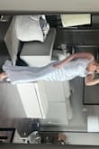 I absolutely love this dress - got it in white as a potential dress for my rehearsal dinner. It is so pretty, flattering and the material is very nice. It is definitely a more shiny satin. I ordered a small and wish I had gotten a medium, but I will just make the small work. I'm a 34D and the dress is pretty tight on the chest area, but it's doable. - Noelle J.