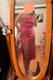 This is a beautiful dress! I, unfortunately, had to return though as the size was off for me. It was tight around the hips, but I had a lot of room around my stomach, and it fits perfectly on my chest! Due to the tightness of the bottom, the slit was looking large. I would love to try ordering this again in a different color but have no idea what size I would go with. - Elyse G.