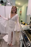 This is the perfect dress for a boho bride on a budget! I can't believe women spend 2000 on a dress and I found this steal. The sleeves are so fun for dancing at the reception. The top has the perfect amount of cleavage. - Erin G.