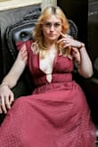 The dress was incredibly beautiful and extremely good quality. I received compliments all evening! I'd highly recommend picking up some boob tape for this dress. Being able to play with your cleavage takes the dress to a whole new level. - Elizabeth G.